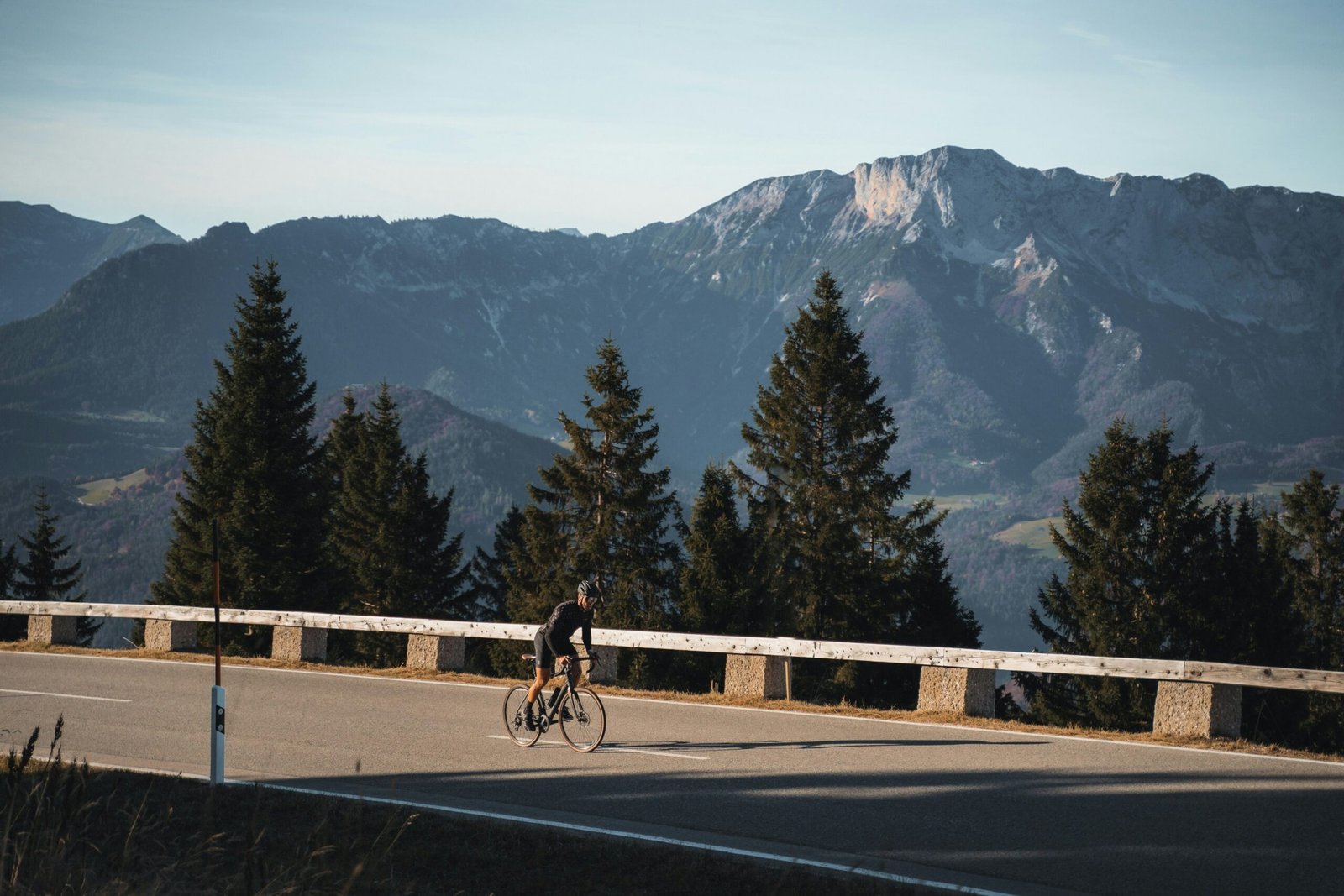 Cyclists performing interval training on scenic route