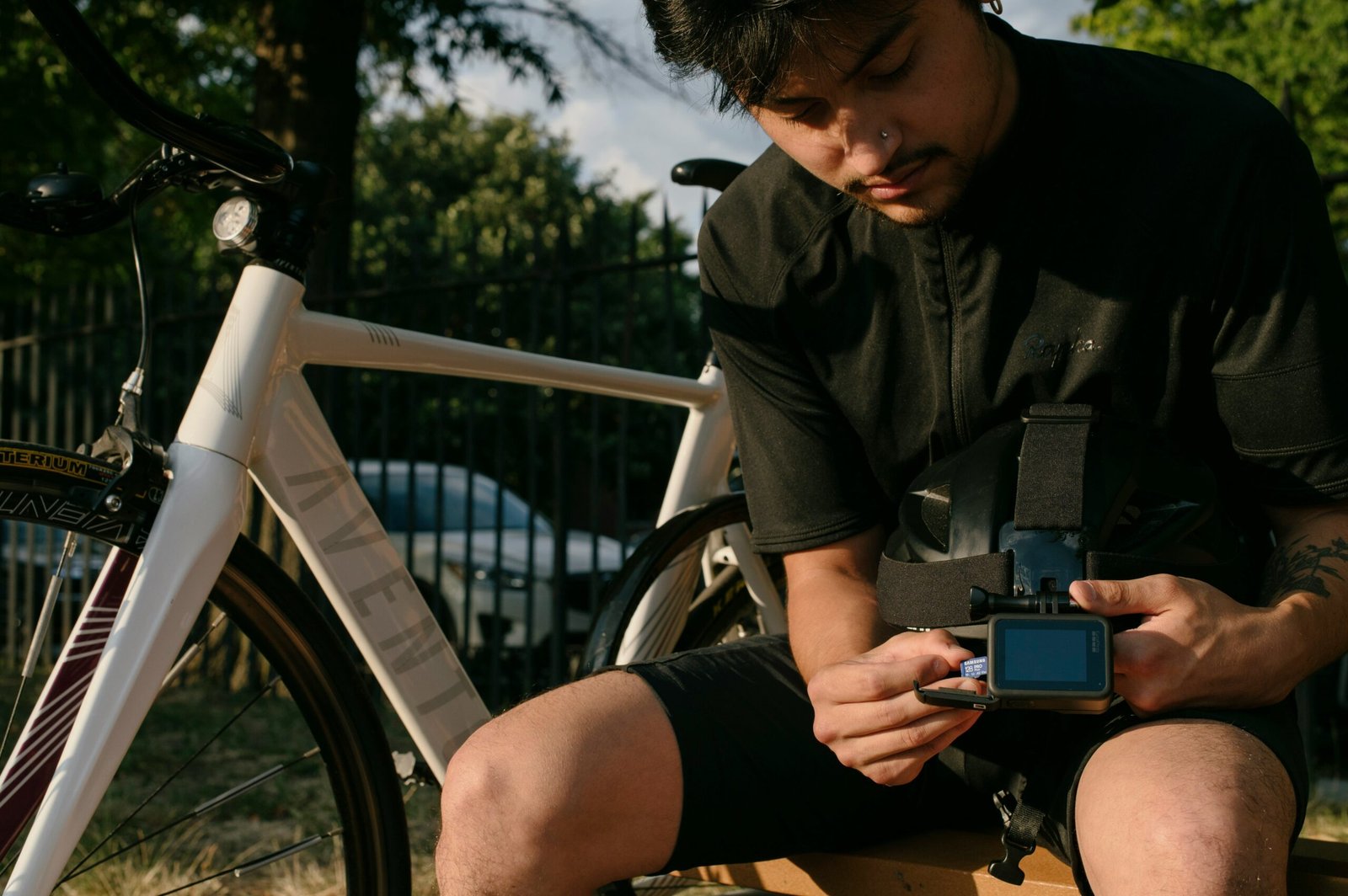 Screenshot of a Strava app displaying a cyclist's weekly stats including total miles and elevation gained.