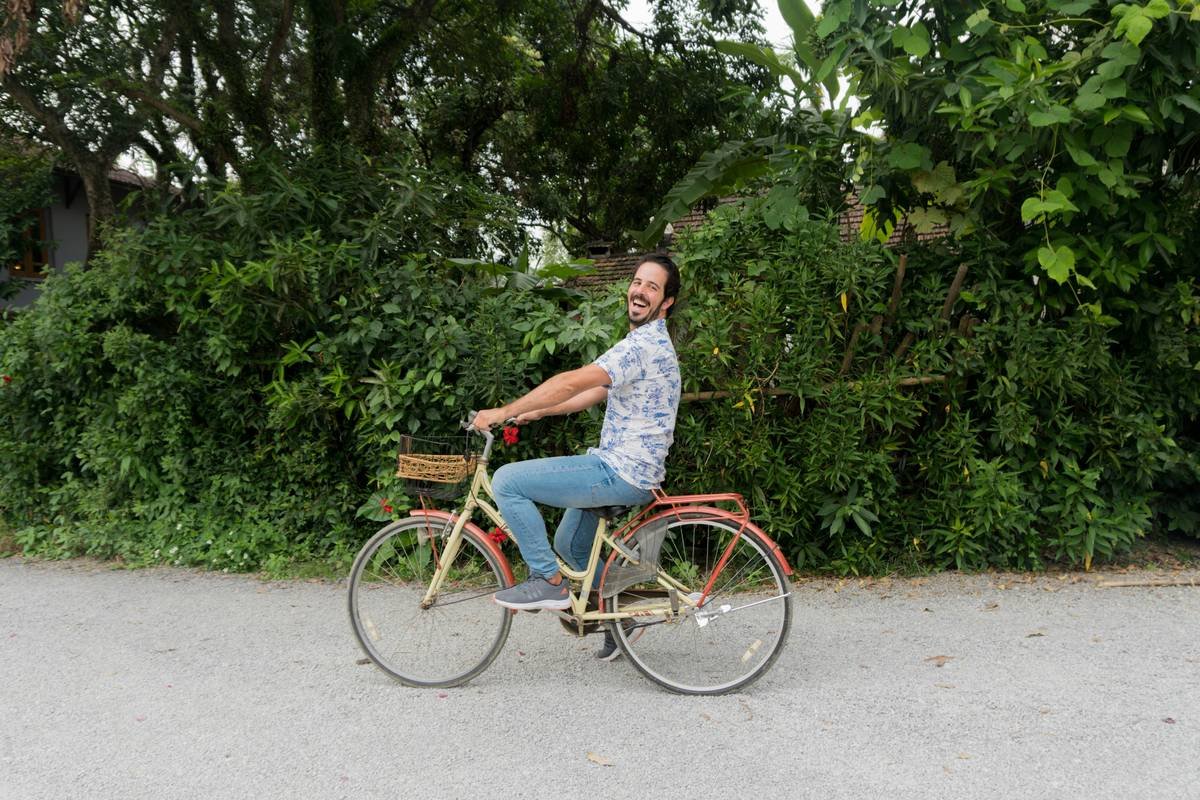 Close-up shot of essential cycling gear including helmet, gloves, and shoes.